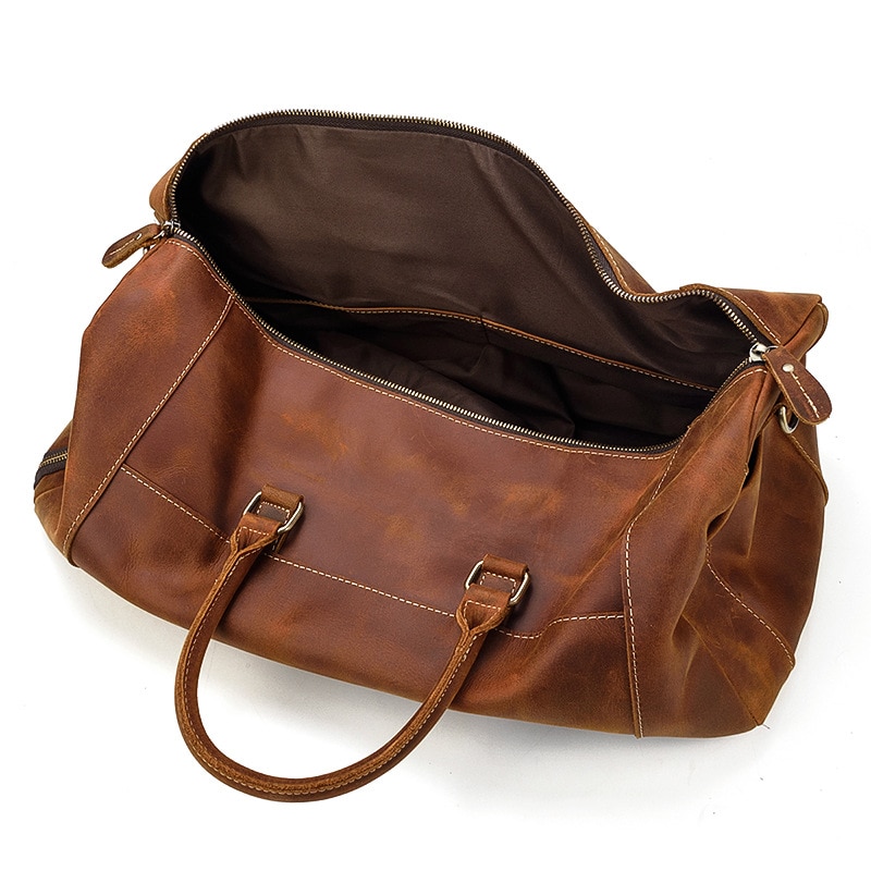 Beautiful vintage men's travel bag in cow leather.