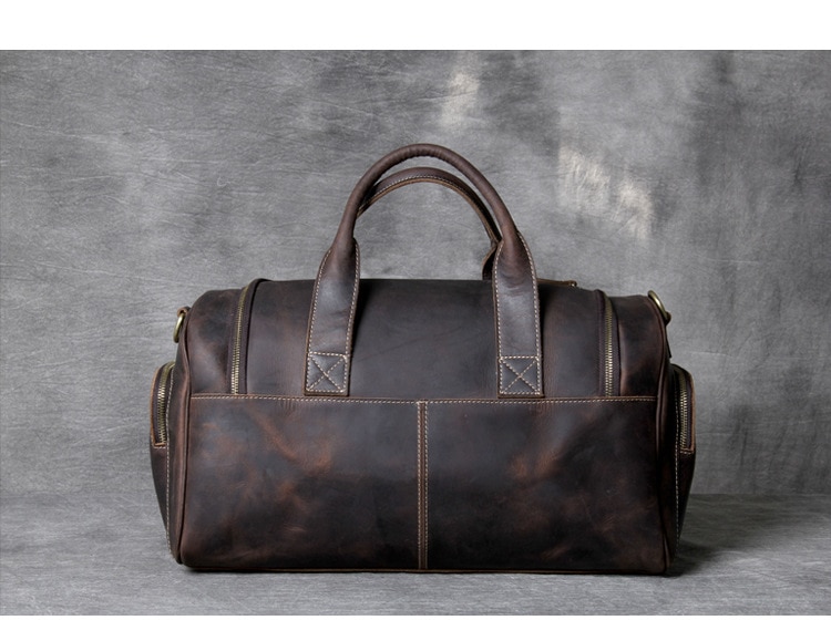 High-quality dark brown leather travel bag for gentleman.