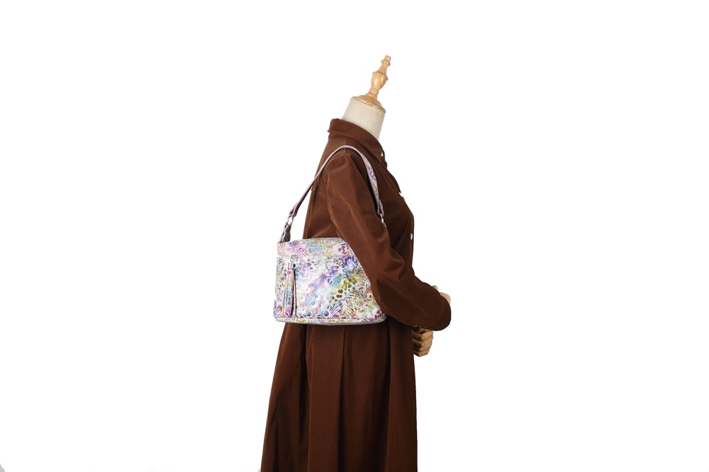 Women's colourful peacock pattern leather crossbody bag.