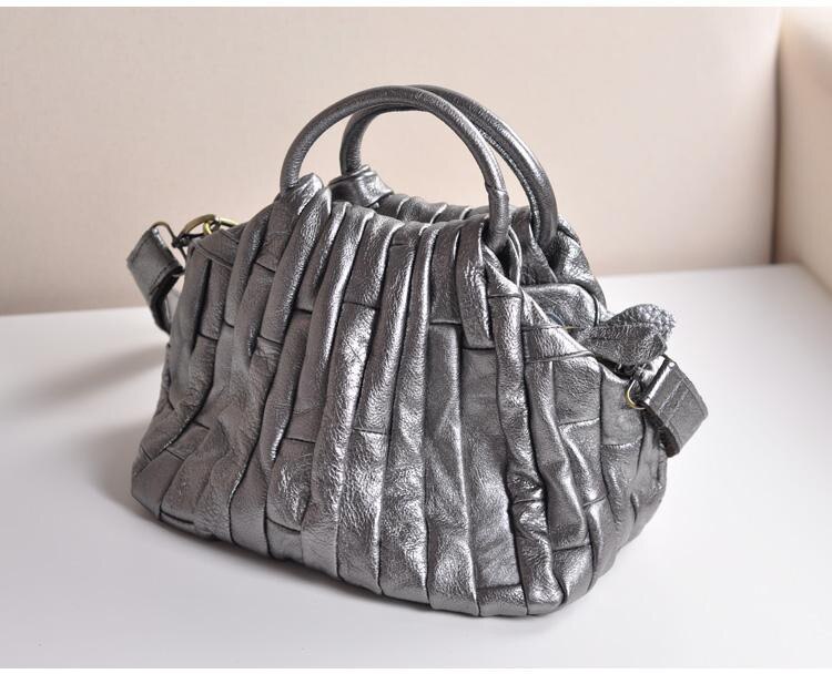 Dark silver handbag in genuine leather for lady.