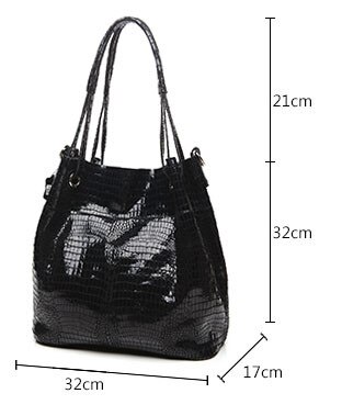 Women's bags with shiny crocodile pattern.
